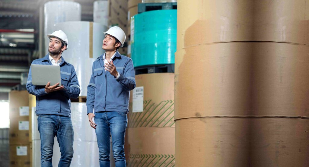 Two men working in a warehouse